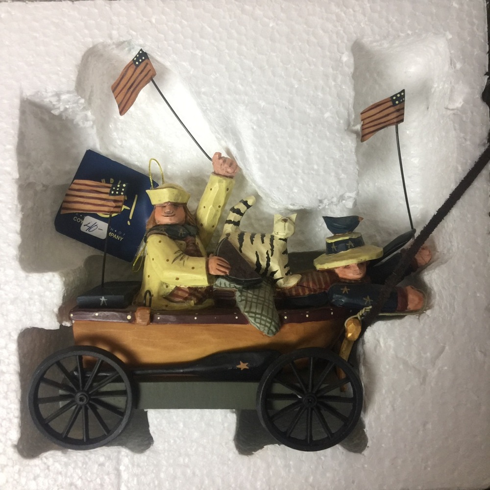 Williraye Studio “Kids in boat pull toy” figurine